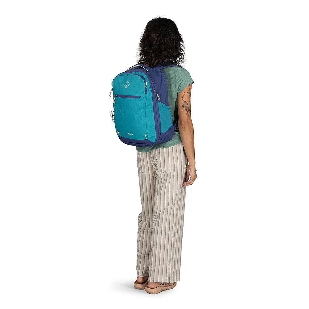 Woan wearing Osprey Daylite 26+6 backpack pictured from the back